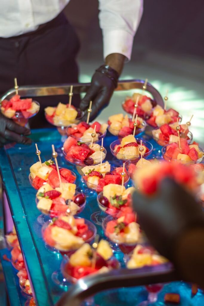 Crafting Captivating Headlines: Your awesome post title goes here Vibrant fruit salad cups prepared by catering staff, perfect for parties and events.